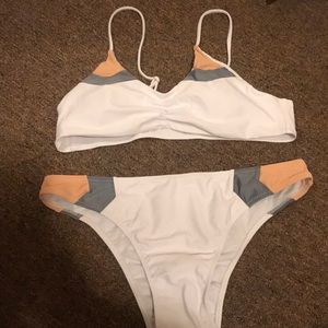 peach, gray and white bikini with cheeky bottoms
